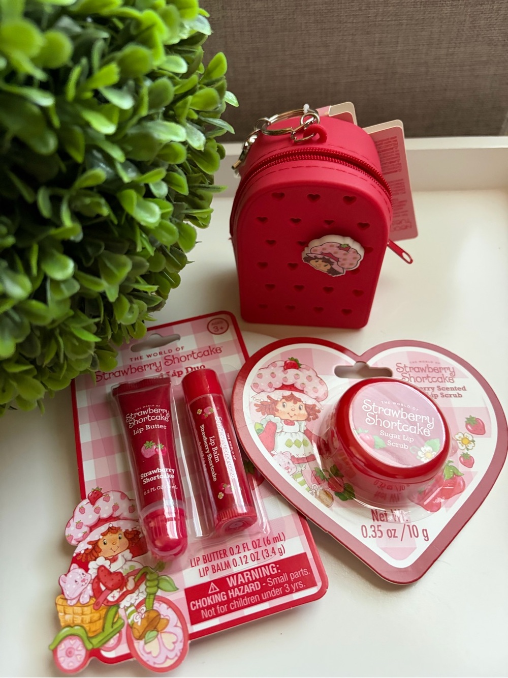 Strawberry Shortcake Pink Lip Care Trio with Matching red Mini backpack Case